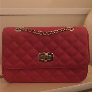Express pink quilted handbag